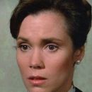 Robin Dearden- as Kay Davis