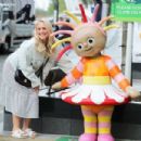 Amy Walsh – Have a picture with a Upsy Daisy statute in Media City Salford