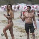 Brazilian model and her boy toy spotted taking selfies on the beach in Miami, Florida on March 25, 2017