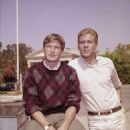 Christopher Connelly and Ryan O'Neal as Norman and Rodney Harrington