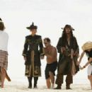 (L-R) GEOFFREY RUSH, MARK HARDEN, KEIRA KNIGHTLEY, and JOHNNY DEPP with dressers doing final touches. Photo Credit: Peter Mountain © Disney Enterprises, Inc. All Rights Reserved.