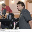 Director Peter Cattaneo sets up a shot on the set of THE ROCKER. Photo credit: George Kraychyk