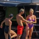 Caroline Stanbury – Seen In a purple bikini with her husband Sergio Carrallo at Mykonos
