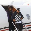 Anjali Ranadivé and Tyga Getting off a Jet Plane 12/2014