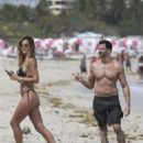 Brazilian model and her boy toy spotted taking selfies on the beach in Miami, Florida on March 25, 2017