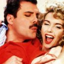 Freddie Mercury and Debbie Ash in music video for "I was born to love you."
