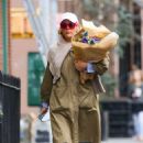 Busy Philipps – Shops for flowers in New York