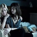 Kirsten Dunst, Charlotte Gainsbourg and Cameron Spurr in Melancholia (2011)