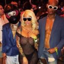 Amber Rose and The Migos at at the Coachella Valley Music And Arts Festival in Indio, California - April 17, 2017