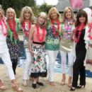 Turning back the clock: Nina Carter, third right, stands with, left to right, Susie Juul, Ingrid Tarrant, Carole Ashby, Sara Walkden, Jilly Johnson, Vicki Michelle and Tilly Mezzina