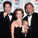 David Duchovny, Gillian Anderson and the Producer Chris Carter At The 55th Annual Golden Globe Awards (1998)