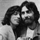 George Harrison and Mick Jagger backstage at a Rolling Stones concert at the Los Angeles Forum on July 10, 1975