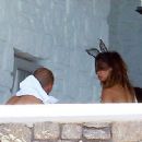 PICTURE EXCLUSIVE: Bikini clad Nicole Scherzinger, 37, smooches footballer Pajtim Kasami, 23, in Greece as ex Lewis Hamilton pays tribute to her on her birthday