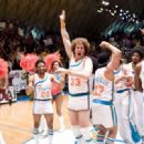 Jay Phillips (left) as “Scootsie Doubleday” celebrates on the court with Will Ferrell (center) as “Jackie Moon” and the rest of their Flint Tropics teammates in New Line Cinema’s comedy, SEMI-PRO. Photo Credit: Frank Masi/New