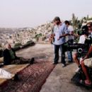 Rana Sultan, Nadim Sawalha and Director/writer Amin Matalqa on the set of Captain Abu Raed.