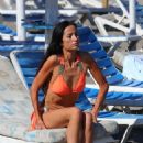 Chantelle Houghton – Seen in Marbella wearing a coral coloured bikini