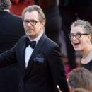 Gary Oldman and his wife Gisele Schimdt attends the 90th Annual Academy Awards at Hollywood & Highland Center on March 4, 2018 in Hollywood, California