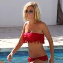 Jenny Frost spending a day - poolside in Ibiza, 08.01.2011