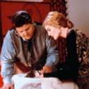 Rene Russo and Robbie Coltrane