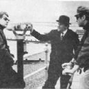 James Booth and Roy Kinnear in discussion with director Ken Russell on set of 'French Dressing' at Herne Bay 1963