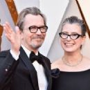 Gary Oldman and his wife Gisele Schimdt attends the 90th Annual Academy Awards at Hollywood & Highland Center on March 4, 2018 in Hollywood, California