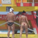 Lis Vega – in a red bikini at the beach in Miami