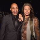 Writer/director John Ridley and singer Steven Tyler arrive to the Los Angeles premiere of 'Jimi: All Is By My Side' at ArcLight Cinemas on September 22, 2014 in Hollywood, California.