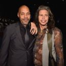 Writer/director John Ridley and singer Steven Tyler arrive to the Los Angeles premiere of 'Jimi: All Is By My Side' at ArcLight Cinemas on September 22, 2014 in Hollywood, California