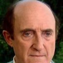 Ron Moody- as Inspector Henry Kyle