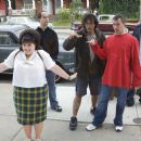 Director Adam Shankman (center right) reviews a scene with Nikki Blonsky (front left), 1st Assistant Director Daniel Silverberg (rear left), Director of Photography Bojan Bazelli (center) and Executive Producer Garrett Grant on the set of New Line Cinema&