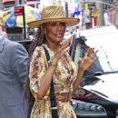 Terry Ellis – Photographed in a snake print dress with Rhona Bennett in New York