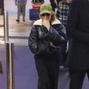 Kylie Minogue – Seen arriving in the early morning at Sydney Airport with a friend