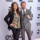 Steven Tyler and Dierks Bentley attend the 48th annual CMA Awards at the Bridgestone Arena on November 5, 2014 in Nashville, Tennessee.