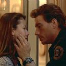 Jean-Claude Van Damme and Mia Sara