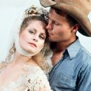Beverly D'Angelo and John Savage