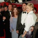Arnold Schwarzenegger, Maria Shriver, Phil Bronstein and Sharon Stone - The 70th Annual Academy Awards (1998)