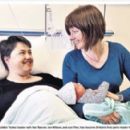 BABY JOY! - Ruth Davidson, the Scottish Tories' leader with her fiancee Jen Wilson, and son Finn, has become Britain's first party leader to give birth while in office