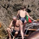 Stella Mccartney – Sunbathing on her boat on holiday in Capri