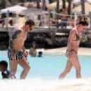 Candice Brown – In a bikini Hits the beach in Cancun - 454 x 303