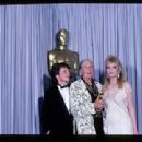 Michael J Fox and Rebecca DeMornay with winner Josie MaCavin during The 58th Annual Academy Awards (1986) - 454 x 310