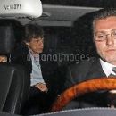 Mick Jagger and L'Wren Scott are escorted out of the back door of Matsuhisa restaurant and into waiting car - 10 February 2011