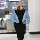Cara Delevingne – Arriving at JFK Airport in New York