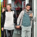 Maria Sharapova and Grigor Dimitrov hold hands during 2013 Wimbledon first rounds
