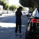 Courteney Cox &#8211; In an all-black ensemble shopping in West Hollywood