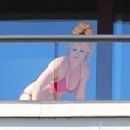 Britney Spears – In red bikini with boyfriend Sam Asghari in Hawaii