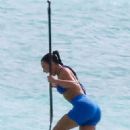 Kim Kardashian – Seen in a blue top bikini at the paddle boarding session in Turks - 454 x 681