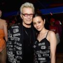 China Chow and Billy Idol attend the Moschino Spring/Summer 19 Menswear and Women's Resort Collection at Los Angeles Equestrian Center on June 8, 2018 in Burbank, California - 400 x 600