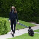 Troian Bellisario – Out for a walk with her dog in Los Angeles - 454 x 469