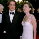 Hugh Grant and Elizabeth Hurley At The 67th Annual Academy Awards