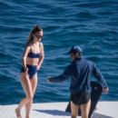 Olivia Wilde – In a bikini with Harry Styles